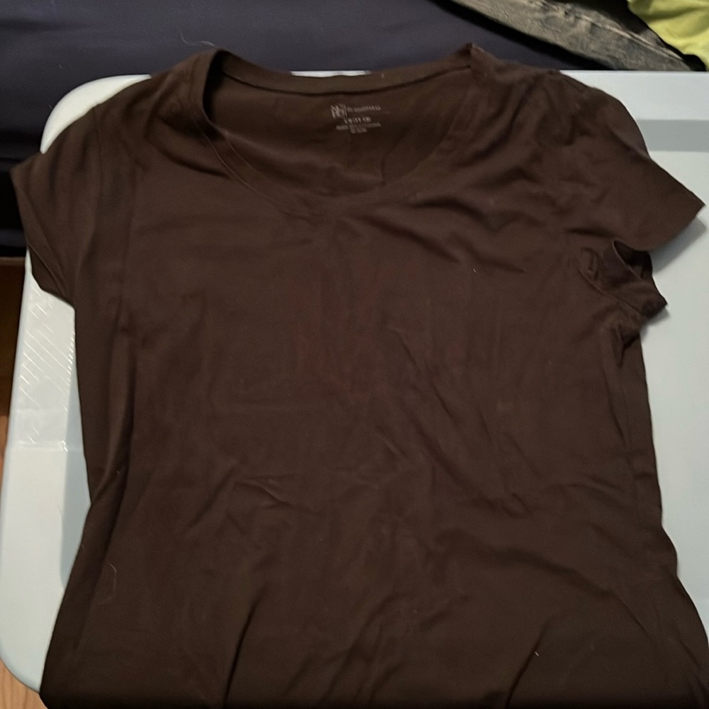 Black shirt is a size large and green shirt is a size small